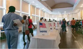  ?? Photograph: MohammadJa­vad Jahangir/Rex/Shuttersto­ck ?? Voters in Georgia’s primary election this week struggled with long lines, new equipment and social distancing.