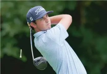  ?? AP ?? J.T. Poston made up for two bogeys with a 13½-foot eagle putt on the 17th hole at the John Deere Classic.