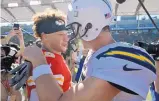  ?? AP FILE ?? Chargers QB Philip Rivers, right, and the Chiefs’ Patrick Mahomes greet each other after their Week 1 meeting in LA, a 38-28 KC victory.