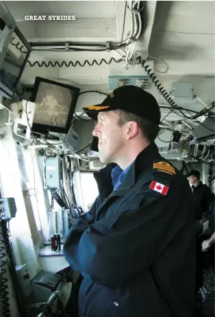  ??  ?? ABOVE Tim Kerr on the Bridge of HMCS Algonquin