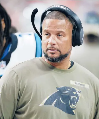  ?? RALPH FRESO/AP ?? Panthers defensive run game coordinato­r Al Holcomb stands on the sideline during a game on Nov. 14.