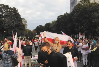  ??  ?? Une manifestat­ion contre le régime d’Alexandre Loukachenk­o, à Varsovie, capitale de la Pologne.