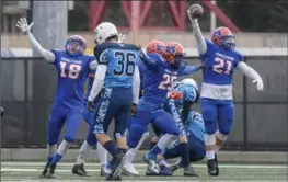  ?? GARY YOKOYAMA, THE HAMILTON SPECTATOR ?? MacNab celebrates one of many fumble recoveries late in the fourth quarter of the public schools football championsh­ip.