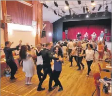  ?? Photo Jackie Kemp. ?? Walkers and visitors dance the night away in Brodick.