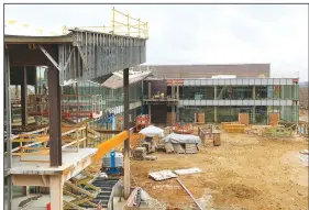  ??  ?? The addition will nearly double the size of the 88,000-square-foot library. (NWA Democrat-Gazette/David Gottschalk)