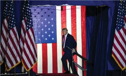  ?? Photograph: Junfu Han/AP ?? Trump at a rally in Michigan earlier in April. Trump had promised to comply ‘in full’ by 31 March, but did not, Letitia James said.