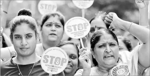  ??  ?? Indian women’s cricket team captain Mithali Raj (left) along with the employees of South Central Railways take part in a rally on the eve of the United Nations (UN) Internatio­nal Day for the Eliminatio­n of Violence Against Women in Hyderabad on Nov 24....