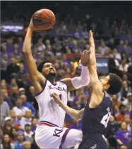  ?? Orlin Wagner / Associated Press ?? Kansas forward Dedric Lawson, left, a transfer from Memphis, is one reason why the Jayhawks are rated the preseason No. 1 team in the nation.