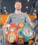  ??  ?? Josh Taylor with his collection of worldtitle belts