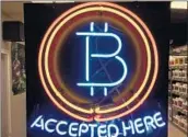  ?? GILLIAN FLACCUS/AP ?? The proliferat­ion of bounty campaigns is one reason ICOs raise money at a record pace, despite ad bans and this year’s steep selloff in virtual currencies such as bitcoin.