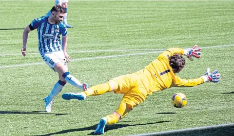  ??  ?? Montrose keeper Allan Fleming is unable to prevent Greg Kiltie making it 3-0 for Killie