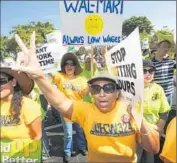  ?? Mark Boster Los Angeles Times. ?? WORKERS say labor actions, such as the 2012 one above, are the real reason for the store closure.