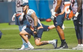  ?? Joe Amon, The Denver Post ?? Broncos linebacker Shane Ray joins teammates Tuesday during drills on the first day of mandatory minicamp at Dove Valley. Ray is scheduled for surgery on his wrist Thursday.