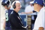  ?? Ted S. Warren / Associated Press ?? John “The Professor” Clayton, an NFL football writer and reporter for ESPN, stands on the sideline during a game between the Seattle Seahawks and the San Francisco 49ers in 2016.