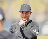  ?? David J. Phillip/Associated Press ?? New York Yankees’ Anthony Rizzo waits for the start of fielding drills during a spring training workout on Feb. 20 in Tampa, Fla.
