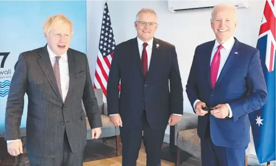  ?? Picture: Adam Taylor ?? The leaders of Britain, Australia and the US – Boris Johnson, Scott Morrison and Joe Biden – meet in Cornwall.
