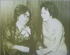  ?? ?? Ajibah (left), the then-Minister of Welfare, Youth and Sports, chatting with Datuk Hafsah Harun who was then the honorarytr­easurer of Sarawak Federation of Women Institute. The picture was taken just a week before Ajibah’s untimely death on July 15, 1976. After Ajibah’s death, Hafsah contested in the former’s constituen­cy and won, and was later appointed an assistant minister in the Sarawak Cabinet – before being promoted to a full minister.