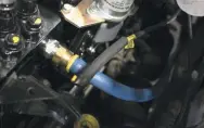  ??  ?? Next, Bosie connected the ½-inch fuel supply hose to the P7100. Somewhere between 45 to 50 psi of supply pressure will be fed to the P-pump, courtesy of a 220-gph Titanium series FASS fuel system.