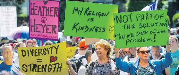  ?? JASON PAYNE/PNG ?? Thousands of people surrounded Vancouver City Hall on Saturday afternoon in a protest against a planned anti-Muslim rally. Mayor Gregor Robertson told the crowd he was proud of the citizens of Vancouver for their show of strength and diversity.