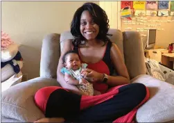  ?? Courtesy photo ?? Kesha Holloway, holding her daughter Phoenix Clarke Holloway, says that she is forever grateful to the emergency response crew that helped her deliver her baby.