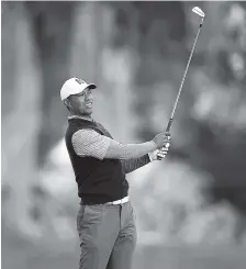 ?? AP PHOTO/RYAN KANG ?? Tiger Woods watches his second shot on the 13th hole during the third round of the Genesis Open Saturday at Riviera Country Club in the Pacific Palisades area of Los Angeles.