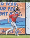  ?? ?? Rome’s Jacob Pearson tracks down a fly ball in center field during Sunday’s game at Adventheal­th Stadium.