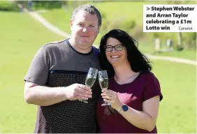 ?? Camelot ?? > Stephen Webster and Arran Taylor celebratin­g a £1m Lotto win