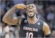  ?? Gregory Shamus Getty Images ?? Duane Notice of South Carolina scored 17 points against Duke.