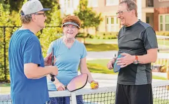  ?? Photos courtesy of Eagle’s Trace ?? The outdoor pickleball court is a popular new venue at Eagle’s Trace. Residents also enjoy many types of cardio and strength training in the community’s main fitness center (below).