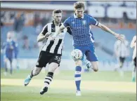  ??  ?? THAT’S MINE: Sheffield Wednesday’s captain Glenn Loovens during their win over second-placed Newcastle.