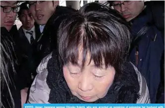  ??  ?? KYOTO, Japan: Japanese woman Chisako Kakehi, who was arrested on suspicion of poisoning her husband with cyanide in the latest ‘Black Widow’ case, arrives at the Kyoto district court. —AFP