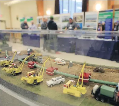  ?? DAVE CHAN FOR NATIONAL POST FILES ?? A model of a pipeline constructi­on site on display in Brinston, Ont., one of the communitie­s where TransCanad­a held informatio­n sessions on the proposed Energy East pipeline for local residents.