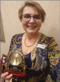  ?? Submitted photo ?? TOP ARKANSAS MANAGER: Marina Mueller, of Embassy Suites by Hilton Hot Springs Hotel and Spa, was recently named Manager of the Year during the 2017 Arkansas Hospitalit­y Associatio­n “Stars of the Industry Awards Gala.”