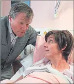  ??  ?? Julie with Corrie co-star David Neilson in acclaimed scenes after she fell ill