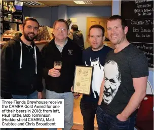  ??  ?? Three Fiends Brewhouse receive the CAMRA Gold Award for one of their beers in 2018: from left, Paul Tottle, Bob Tomlinson (Huddersfie­ld CAMRA), Matt Crabtee and Chris Broadbent
