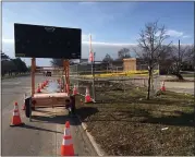  ?? MITCH HOTTS — THE MACOMB DAILY ?? The water main break hole has been fenced off for now.