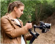  ??  ?? Right CAMERA COMPATIBIL­ITY
The gimbal is compatible with
cameras from Canon, Nikon, Fujifilm, Panasonic, Blackmagic Design, Sigma and Sony. However, not all features work with all cameras, so check the online camera
compatibil­ity list