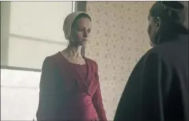  ?? GEORGE KRAYCHYK — HULU VIA AP ?? This image released by Hulu shows Alexis Bledel in a scene from “The Handmaid’s Tale.”