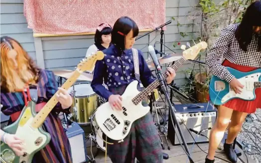  ?? LA Family Housing Home Together 2021 ?? The Linda Lindas perform during LA Family Housing’s Home Together virtual event in April 2021. The multiracia­l punk group won sudden renown when a video of their performanc­e of “Racist, Sexist Boy” at a public library went viral.