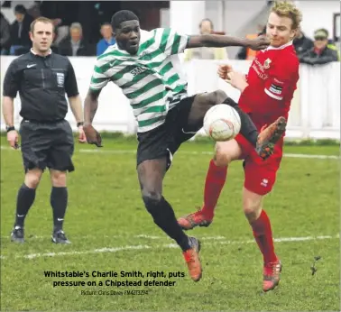  ?? Picture: Chris Davey FM4273294 ?? Whitstable‘s Charlie Smith, right, puts pressure on a Chipstead defender