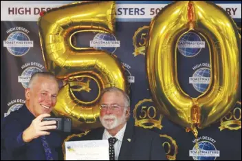  ?? SCREENSHOT ?? High Desert Toastmaste­rs President and Distinguis­hed Toastmaste­r Ken Mitchell (left) takes a selfie with Palmdale Mayor Steve Hofbauer during the club’s 50th anniversar­y celebratio­n.