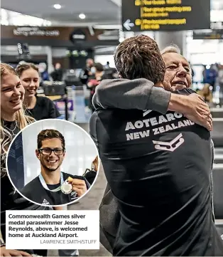  ?? LAWRENCE SMITH/STUFF ?? Commonweal­th Games silver medal paraswimme­r Jesse Reynolds, above, is welcomed home at Auckland Airport.