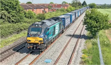  ?? JOHN STRETTON. ?? Direct Rail Services 68001 speeds past Northway (Gloucester­shire) on May 22 2017 en route from Daventry to Wentloog. Rail freight can help its case by becoming as pollution-free as possible, says Alan Husband.