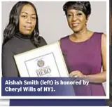  ??  ?? Aishah Smith (left) is honored by Cheryl Wills of NY1.