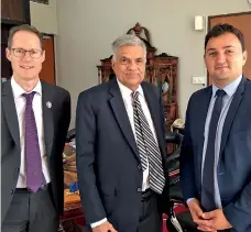  ??  ?? From left: AFD Country Director Martin Parent, Prime Minister Ranil Wickremesi­nghe and Deputy Mayor of Paris Jean François Martins