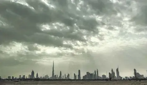  ?? Clint Egbert/Gulf News ?? Rain clouds over the Dubai skyline. The highest accumulate­d rainfall till 3pm yesterday was 193mm, the NCMS said.