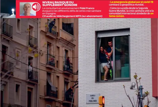  ?? (Sipa) ?? Una familia se asoma a la ventana de su piso en Barcelona.