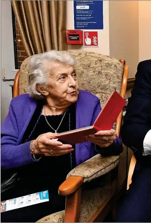  ??  ?? POSITIVE SIGNS: Residents at a retirement home in Boris Johnson’s Uxbridge constituen­cy ask for his autograph yesterday – as he prepared to launch the Conservati­ve manifesto vowing no tax rises