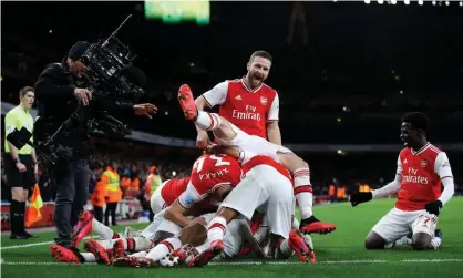  ??  ?? Shkodran Mustafi, here celebratin­g an Arsenal goal against Newcastle, says Mikel Arteta has talked about ‘simple things you have to remember’. Photograph: Richard Heathcote/Getty Images