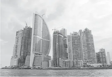  ?? Arnulfo Franco / Associated Press file ?? The Trump Internatio­nal Hotel in Panama is in the third tower from the left, looking like a wind-filled sail.